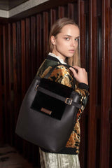 shoulder bag in black leather and black velvet